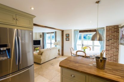 The open plan kitchen and dining room at Brightwaters Stables, Hampshire
