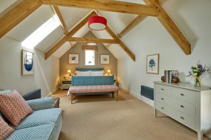 A double bedroom at The Barn at Ampneyfield, Gloucestershire