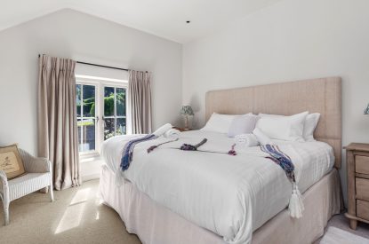 A super king sized bedrom at Little Haven, Gower