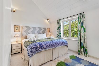 A super king sized bedrom at Little Haven, Gower