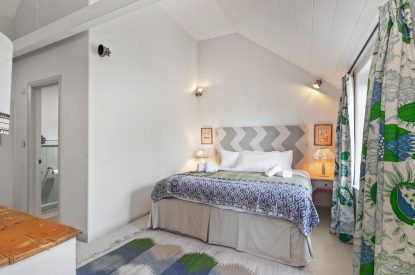 A super king sized bedrom at Little Haven, Gower
