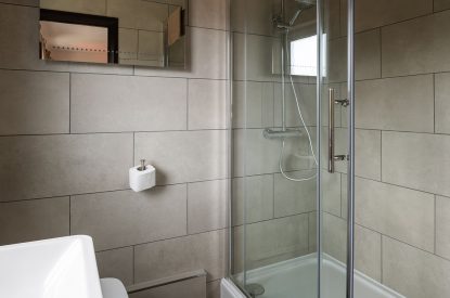 A shower room at Lake House, Powys