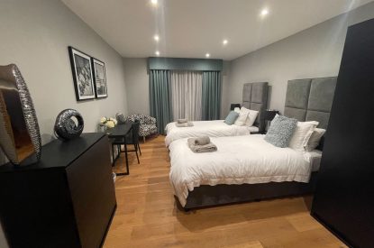 A twin bedroom at The Moorings, Cornwall