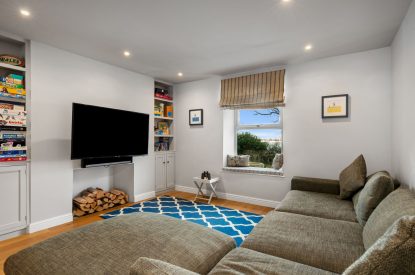 The living room/games room at Channel View, Oxwich