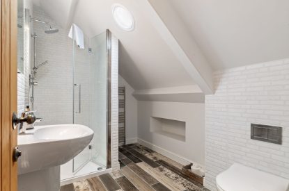 A shower room at Channel View, Oxwich