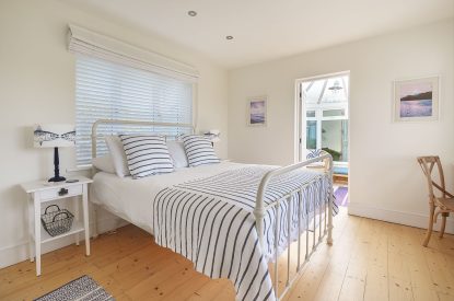 A king size bedroom at Y Wenffrwd, Abersoch