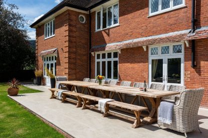 Outdoor dining at The Vineyard Lake House, Malvern Hills