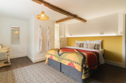 A king size bedroom at The Great Hall, Chapmanslade, Wiltshire
