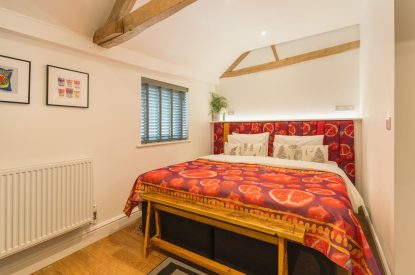 A super king size bedroom at Bright House, Chapmanslade, Wiltshire