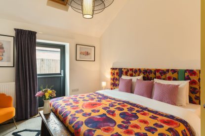 A super king size bedroom at Bright House, Chapmanslade, Wiltshire