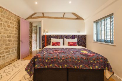 A super king size bedroom at Bright House, Chapmanslade, Wiltshire