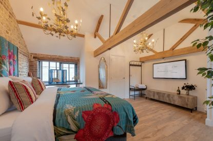 A super king size bedroom at The Pool house, Chapmanslade, Wiltshire