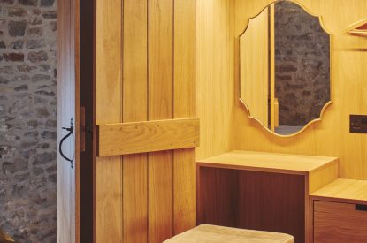 A king size bedroom at Puddle Duck Cottage, Somerset