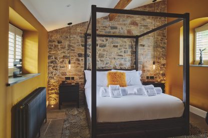 A four poster bedroom at Somerset Estate, Glastonbury, Somerset