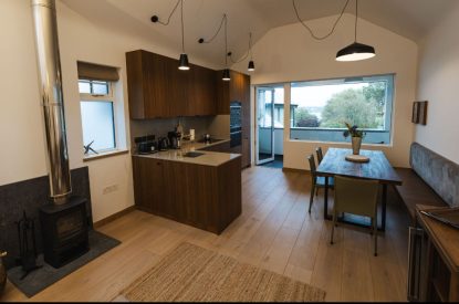 Open plan living space at Potter's Cottage, Roundstone, Galway