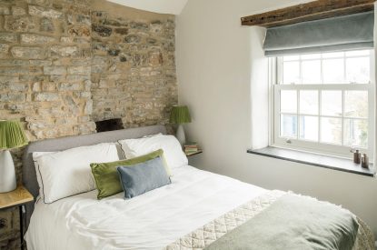 A king size bedroom at Sweet Pea Cottage, Litton, Peak District