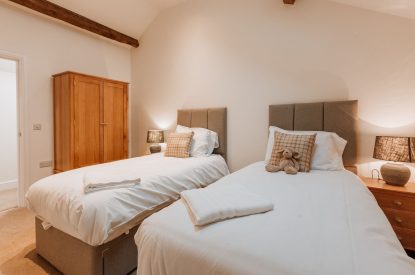 A twin bedroom at Denman, Shropshire