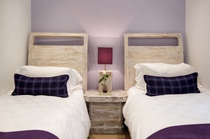 A twin bedroom at Lomond House, Loch Lomond