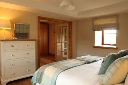 A super king size bedroom at Stuart House, St Andrews