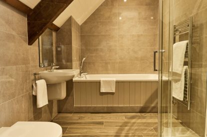 An en suite bathroom at Caspian House, Northumberland