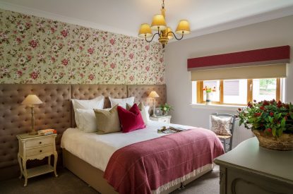 A super king size bedroom at The Clans, Fife