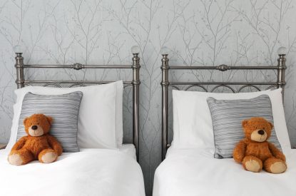 A twin bedroom at Springhill Cottage, Cotswolds