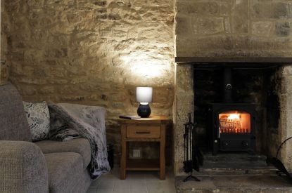 The wood burner at Springhill Cottage, Cotswolds