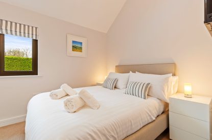 A double bedroom at The Old School, Oxwich