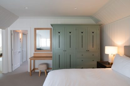 A super king size bedroom at Muirfield Green, East Lothian