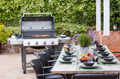 Outdoor BBQ and dining area at Chester House, Cheshire