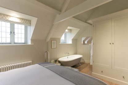 A king size bedroom at The Painswick Retreat, Cotswolds