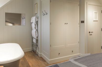 A king size bedroom at The Painswick Retreat, Cotswolds