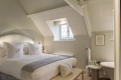 A king size bedroom at The Painswick Retreat, Cotswolds