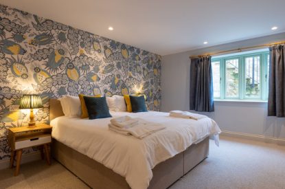 A king size bedroom at Bramble Cottage, Somerset