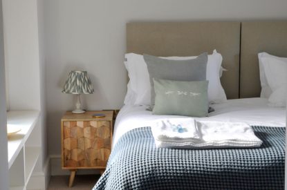 A super king sized bedroom at The Creamery, Somerset