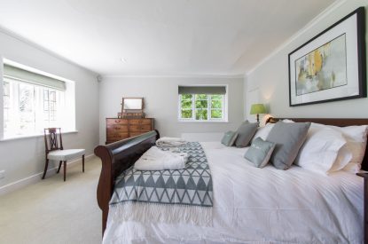 A super king sized bedroom at The Creamery, Somerset