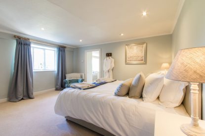 A super king sized bedroom at The Creamery, Somerset