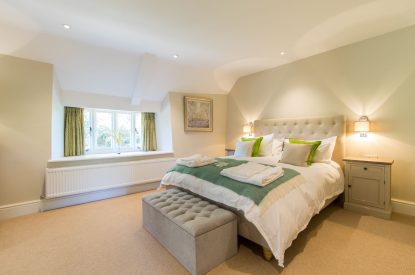 A king sized bedroom at Yew Tree Farmhouse, Somerset