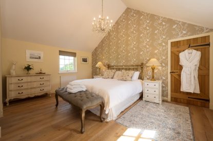 A king sized bedroom at Burnside Farmhouse, Perthshire