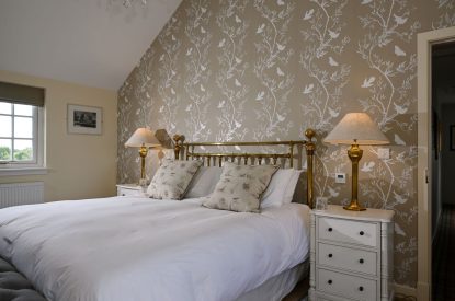 A king sized bedroom at Burnside Farmhouse, Perthshire