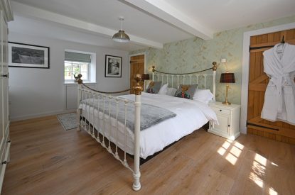 A king sized bedroom at Burnside Farmhouse, Perthshire