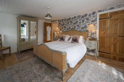A king sized bedroom at Burnside Farmhouse, Perthshire