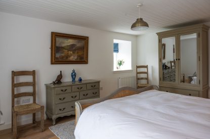 A king sized bedroom at Burnside Farmhouse, Perthshire