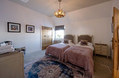 A twin bedroom at Torran Steading, Perthshire