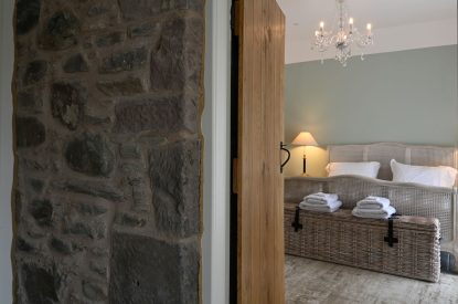 A king sized bedroom at The Highland Croft, Perthshire