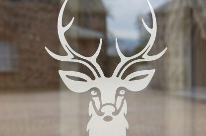 Stag emblem at The Highland Croft, Perthshire