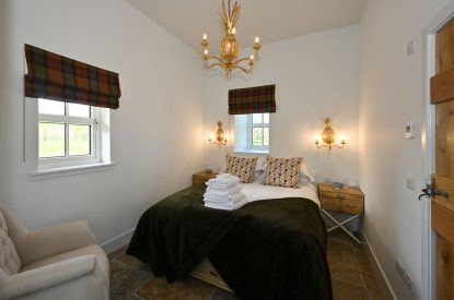 The king sized bedroom at The Wee Hoose, Perthshire
