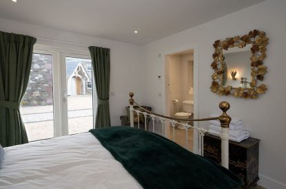 A king sized bedroom at Grousemoor Cottage, Perthshire