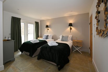 A twin bedroom at Grousemoor Cottage, Perthshire