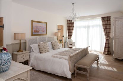 A king sized bedroom at Rowanrigg Steading, Perthshire